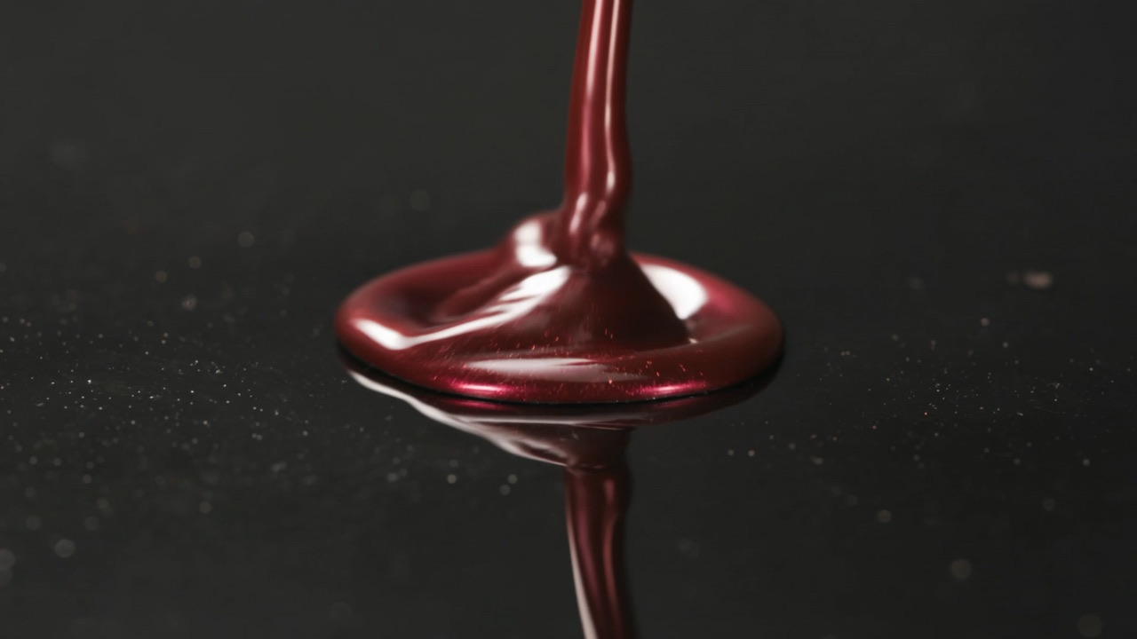 Deep, glossy fresh paint being applied during a full respray
